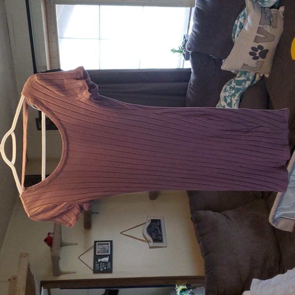 Purple dress with low cut and strap across chest